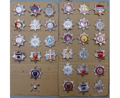 Thirty-two fire brigade cap badges to include Surrey, Dorset, West Yorkshire, Hereford and Worcester, East Sussex, Devon, Ald