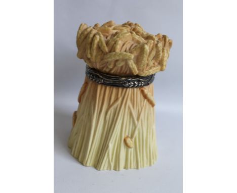 A ROYAL WORCESTER BLUSH IVORY BISCUIT BARREL, with epns fittings in the form of a wheatsheafCondition report: The barrel is c