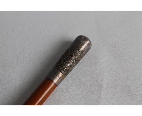 A ROYAL ENGINEER'S PRESENTATION SWAGGER STICK, with hallmarked silver end cap. Die struck badge with engraved inscription '19