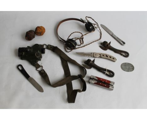 A COLLECTION OF MILITARY COLLECTABLES to include US Army knives, D BCC 410A Communication Control bulls head tin openers etc.