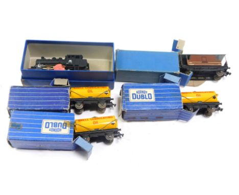 Hornby Dublo wagons, a mineral wagon, Shell Lubricating Oil wagon, goods brake van D1, D1 Shell Lubricating Oil tank wagon, a