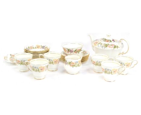 A Royal Albert Country Lane pattern part tea service, comprising teapot, milk jug, sugar bowl, cake plate, six side plates an