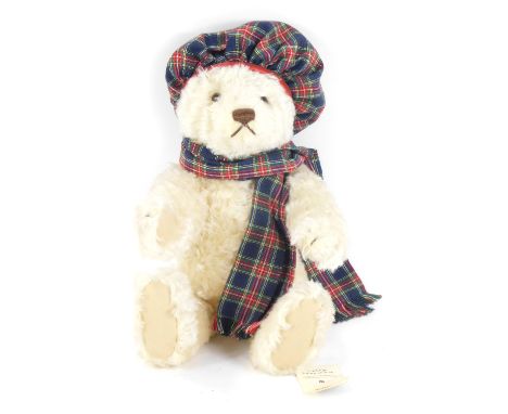 A Steiff Hamish plush blonde Teddy bear, with certificate, serial no. 798, 27cm high.