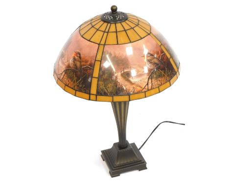 A Eastern inspired table lamp, on square set foot with a robin design shade, 75cm high. 