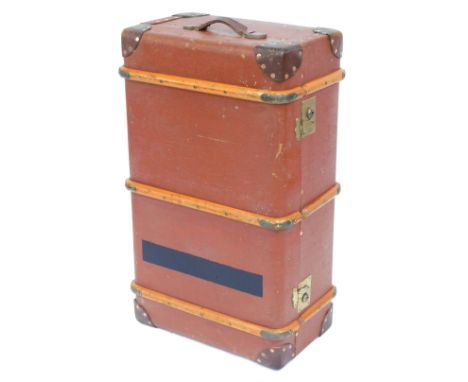 A brown canvas bound trunk, with wooden supports, 30cm high, 84cm wide, 50cm deep. 