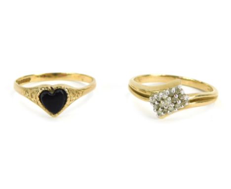 Two 9ct gold dress rings, one with heart shaped centre set with black agate, ring size L and a another set with CZ's on twist