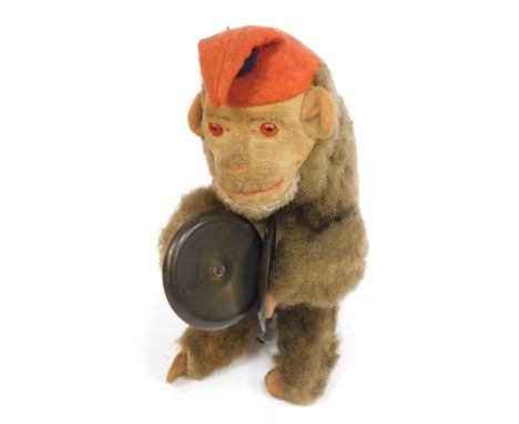 A mechanical monkey with cymbals toy, 18cm high.