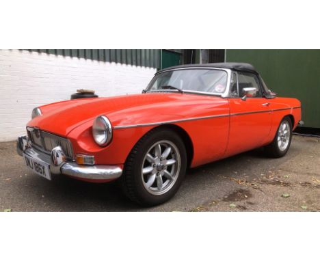 A 1982 MG MGB Sports car, soft top, historic vehicle, registration DMJ 186X, petrol, orange/red, first registered 08/04/1982,