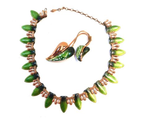 Two items of Matisse enamel jewellery, comprising a brass and green enamel leaf graduated necklace, 36cm long, and a two stra