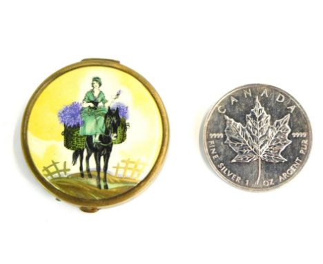 A Canadian silver one ounce coin, and simulated enamel decorated compact, depicting lady with heathers. (2)