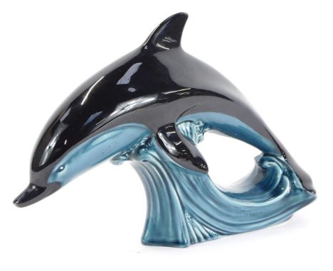 A Poole pottery dolphin, 19cm high. 