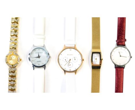 A group of lady's wristwatches, to include a Skagen chronograph on white leather strap, a Skagen stainless and red material s