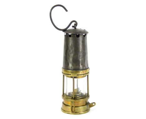 A brass and steel miner's lamp, 24cm high. 