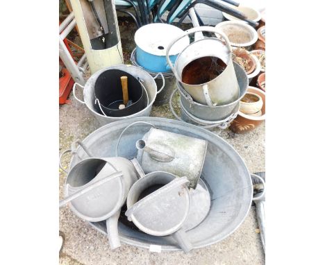 A group of galvanised wares, comprising galvanised tub, four watering cans, six buckets, enamel bin, etc. (a quantity) 