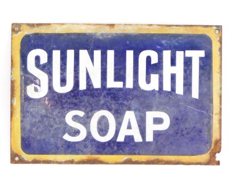 A Sunlight Soap advertising enamel advertising sign, with a yellow border on blue and white central panel, 20cm x 30.5cm.  (A