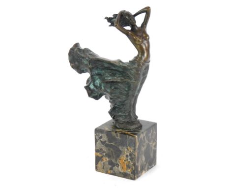 An Art Deco style bronzed figure of a lady in flowing dress, on marble base, 26cm high. 