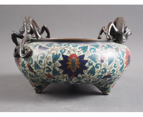 A Chinese cloisonne censer of squat ovoid form, decorated with enamelled lotus flowers within a scrolling foliate ground, the