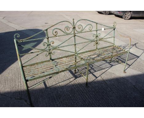 A Regency style green painted wrought iron garden bench, 77" longCondition:There's a loose bit of welding on the most right s