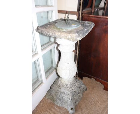 A cast stone sundial with square top, on twisted fluted column, 13 1/2" sq x 34" high