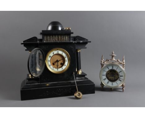 A late 19th century slate and gilt mounted mantel clock, 14 1/2" high, and a silvered case mantel clock, 7 1/2" high