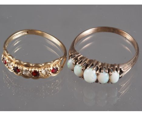 A 9ct gold red and white seven-stone ring, size N, 1.6g, and a yellow metal five-stone opal ring, size R 1/2, 3g