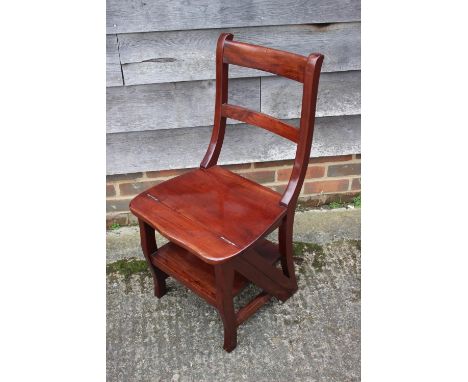 A modern mahogany metamorphic library step 