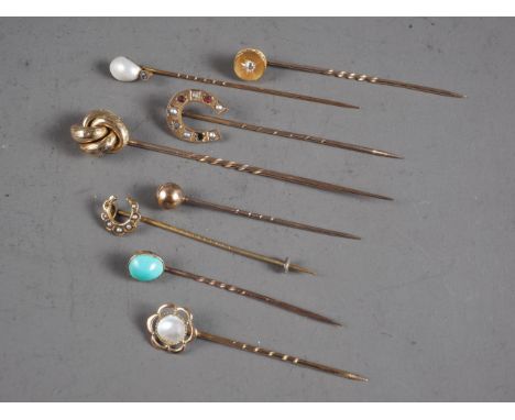 Eight Victorian gold and yellow metal stick pins, various
