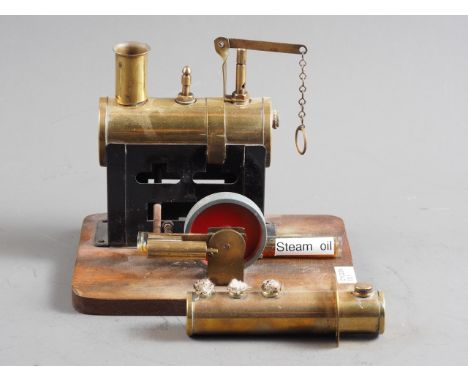 A Cyldon 13.1 static steam engine, on wooden base, 6 3/4" long