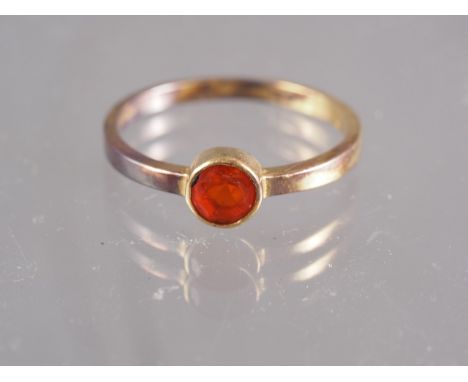 An 18ct gold ring set fire opal, 2.2g, size 'N'
