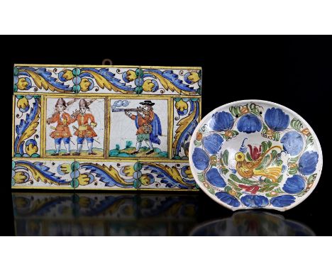 South European earthenware tile tableau depicting soldiers 26x39 cm and earthenware shaving basin with polychrome flower deco
