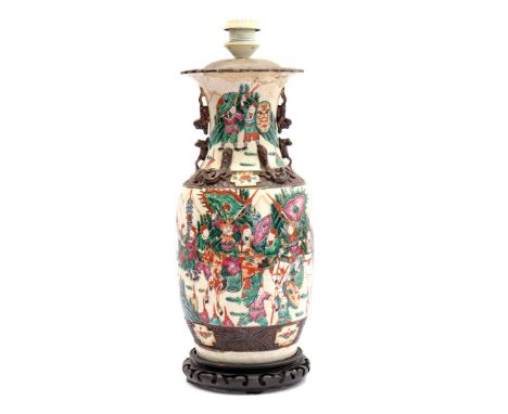 Cantonese porcelain table lamp with a scene of warriors, on a wooden base, 55 cm high without shade