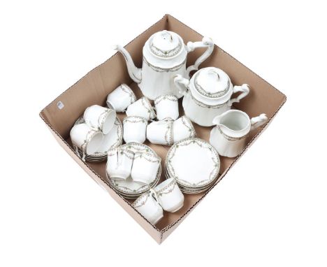 Limoges service consisting of teapot, coffee pot, creamer and 12 cups and saucers