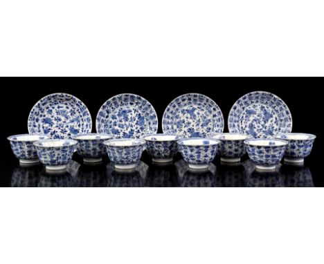 4 porcelain cups and saucers and 5 cups with floral decor and the moon hare on the bottom, symbol for the reunion of lovers, 