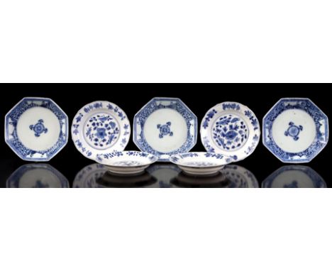 3 octagonal porcelain dishes with lotus flower in the center and decorated edge of persons and flowers, China Kangxi period, 