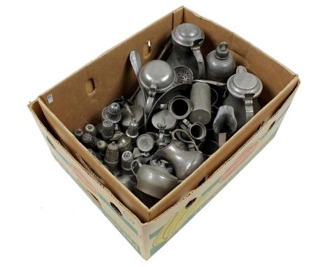 Box with various tin valve jugs, spreaders, measuring jugs, spoons, pitcher, etc.