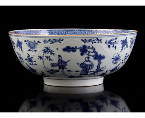 Large porcelain bowl with peony, richly worked pattern in rim on the inside and synchronous scene on the outside of 2 people 