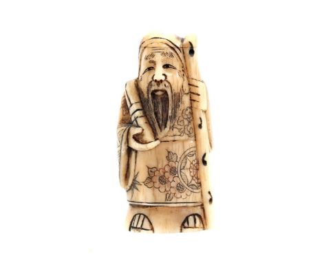 Ivory Netsuke of a standing man with staff, Japan, Meiji period ca. 1900, 5x2.7x2.2 cm, 24.3 grams. With certificate