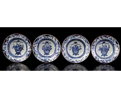 4 porcelain dishes decorated with a richly decorated flower basket in the middle and around it a pattern of chrysanthemums an