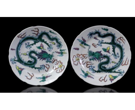 2 plates with dragon decor, with Kangxi character mark, China ca 1920, 17.5 cm diameter
