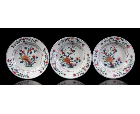 3 Famille Verte porcelain dishes with floral decor, China Kangxi period, 23 cm diameter (edge flakes)