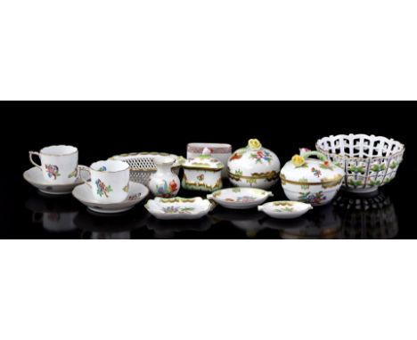 12 pieces Herend Hungary porcelain with various polychrome floral decors, including lidded trays, openwork dishes, vase, cups