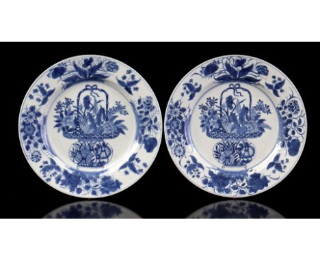 2 porcelain dishes with a decoration of richly decorated flower basket in the middle and around it a border of various flower