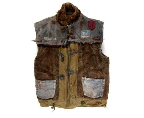 The Postman (1997) - Decrepit jacket from the Warner Bros film. Label attached inscribed PSM-C003.Provenance: With Backlot Pr