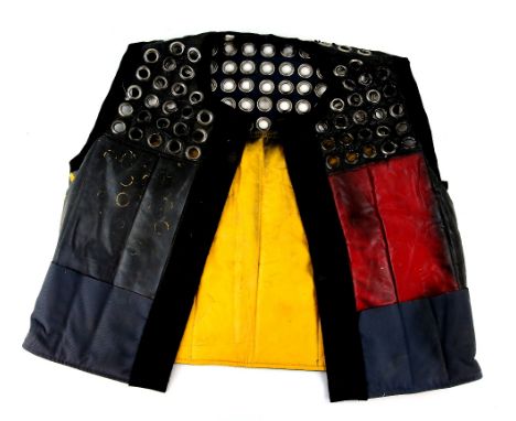 Doctor Who - Resurrection of the Daleks (1984), a red, yellow, black and grey quilted vinyl jacket costume, the upper section