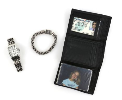 The Man (2005) Collection of props from the movie including Special Agent Derrick Vann's (Samuel L. Jackson's) bracelet, walk