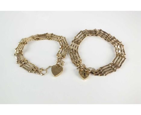 Two 9ct gold four link gate bracelets, each with heart shaped padlock clasp and safety chain, total weight approx 12.8g (2)