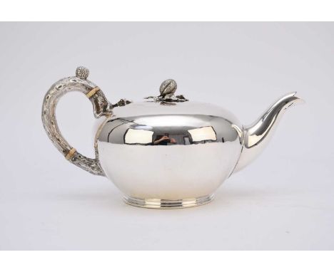 A Victorian silver teapot, Goldsmiths Alliance Ltd, London 1869, of plain polished circular form, the textured handle with iv