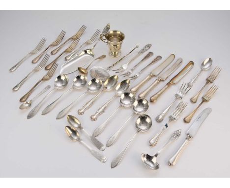 A collection of American silver flatware, various patterns, comprising; a set of twelve table forks with four matching silver