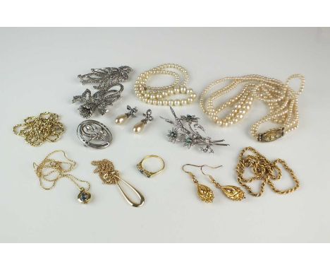 A small collection of jewellery, comprising; two 9ct gold pendants on chains, an untested diamond and sapphire ring, ring siz