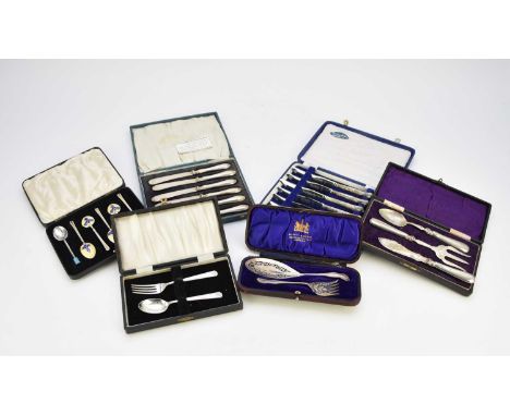 A set of five silver and enamel teaspoons, Birmingham 1954-1956, together with a cased pair of small silver fish servers, two